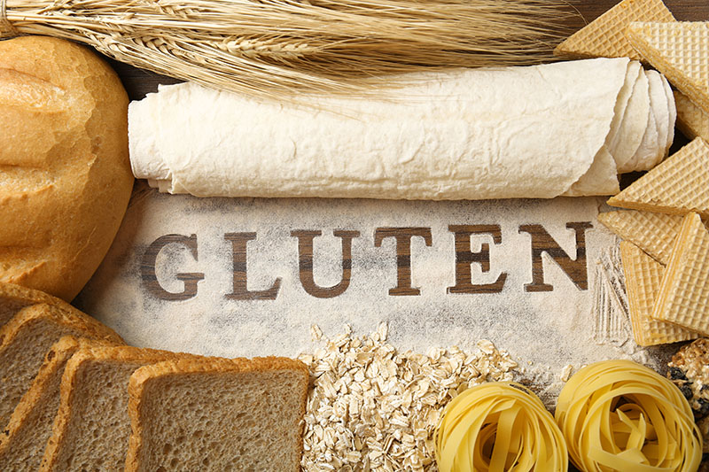 Gluten Bild mit Teig und Brot und Mehl